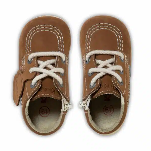 kickers boys brown shoe boots on white floor with shadow