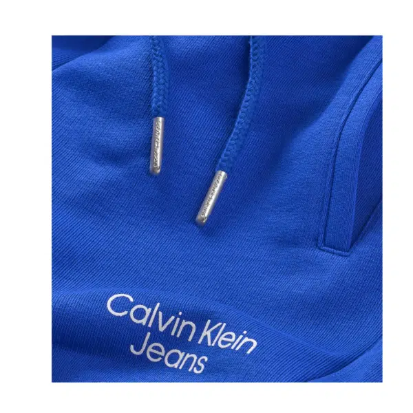 Calvin Klein Jeans boys blue tracksuit bottoms front view