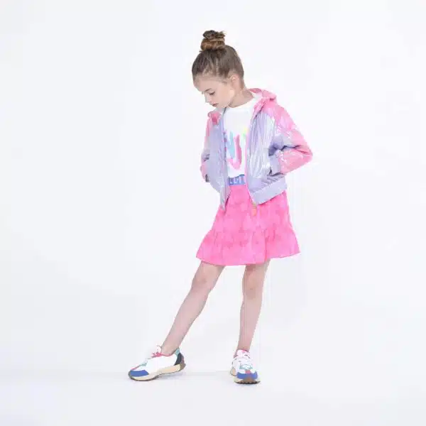 Billieblush girls irridescent multi coloured raincoat on model