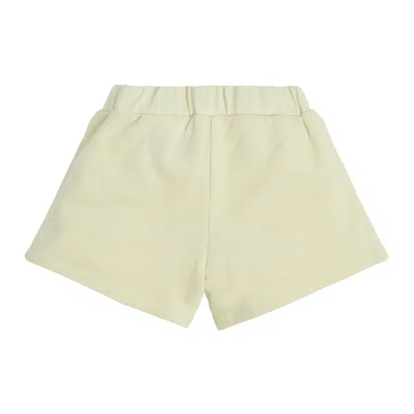 Guess pale yellow girls shorts with green logo