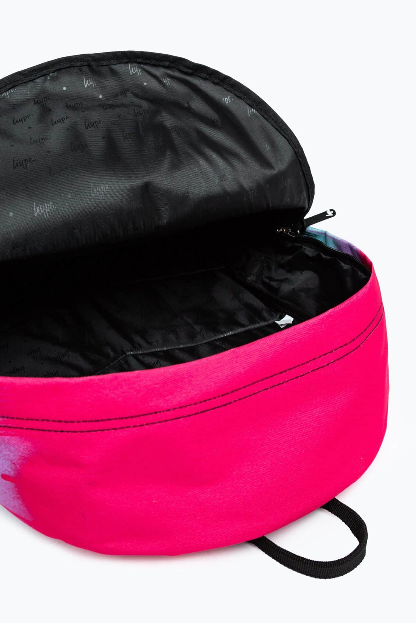 Hype pink and black paint drip backpack front view