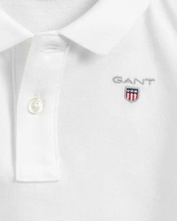 Gant boys white polo shirt with small logo on white background