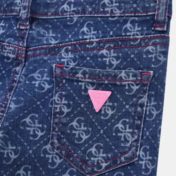 Guess girls denim flare fit jeans with multiple logo closeup