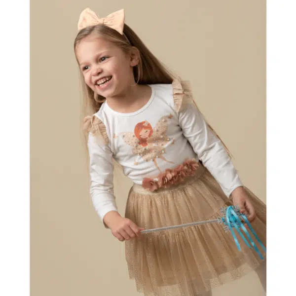 model in caramelo tulle fairy skirt smiling