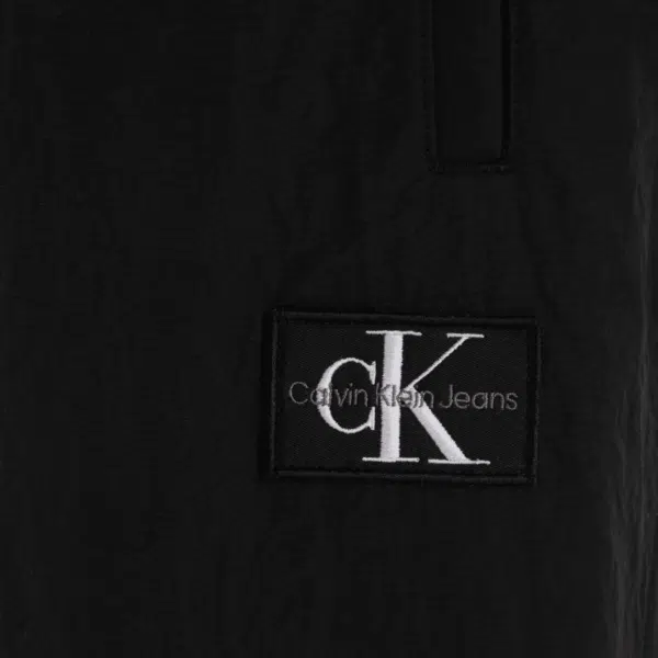 Calvin klein unisex childrens black joggers logo close up