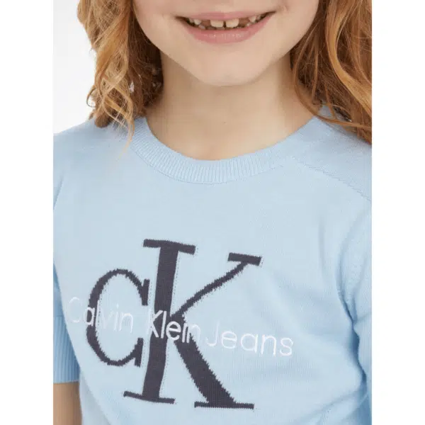 calvin klein jeans monogram girls pale blue sweater close up on girl model