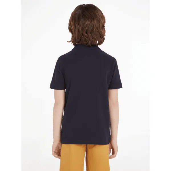 Tommy hilfiger boys black polo shirt on model back view